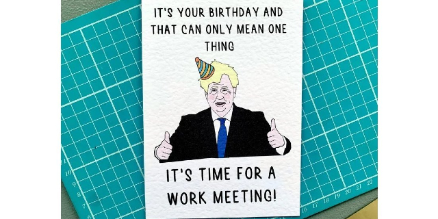 A greetings card featuring a drawing of Boris Johnson wearing a partyhat and giving a double thumbs-up. Above and below the picture are the words 'It's your birthday and that can only mean one thing... it's time for a work meeting!'