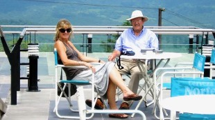 Carolyn Stephens sits in the sun with her father Vincent in Argentina in 2010