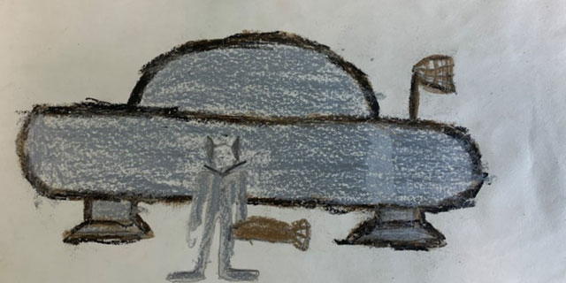 A child's drawing of a UFO and an alien