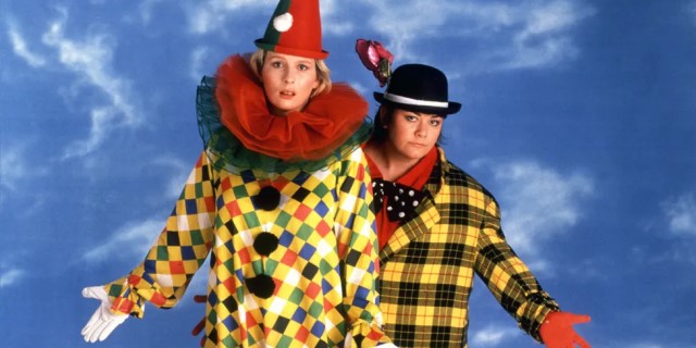 Dawn French and Jennifer Saunders pose, dressed as clowns