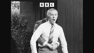 Dr Henry Heimlich demonstrates the Heimlich manoeuvre on TV host Johnny Carson in 1979