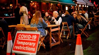 A pub in London's Soho district on 23 September 2020, the day new restrictions were announced