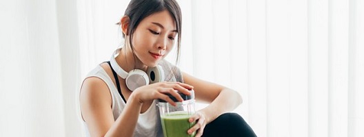 Generic image showing a woman with a health shake