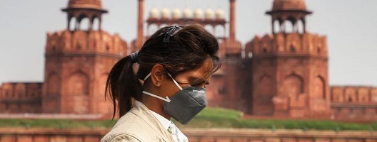 A girl wears a mask to protect herself from the deadly coronavirus in New Delhi, India, on 07 March 2020. 