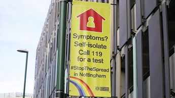 A sign in Nottingham advising people to self-isolate if they show coronavirus symptoms
