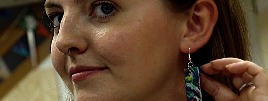 Woman wearing recycled plastic earring