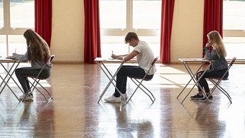 Generic image of pupils in an exam hall