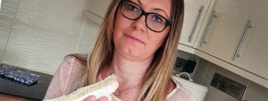 Clare Freer with a cheese sandwich
