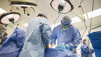 Generic image showing a surgery team working on a patient