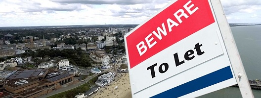 Mocked up image of a to-let sign superimposed over an aerial photograph of Bournemouth