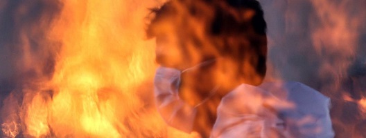 Worker at a crematorium in Delhi