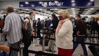 People queuing at London's Heathrow Airport