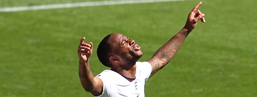 Raheem Sterling celebrates scoring for England