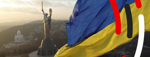 A Ukrainian flag flies over Kyiv