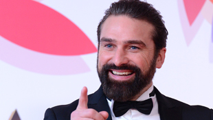 Ant Middleton, smiling and pointing