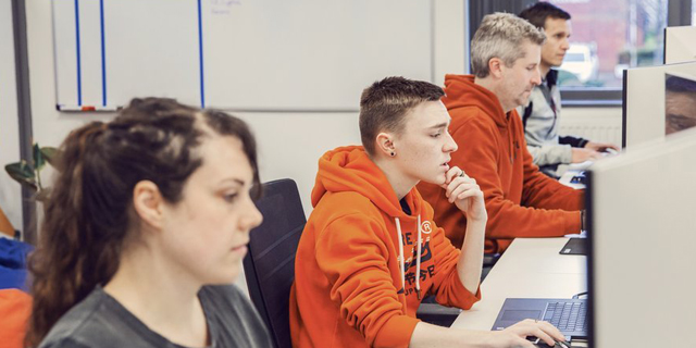 Matthew Hunt (second from left) a junior web developer at Herd. 