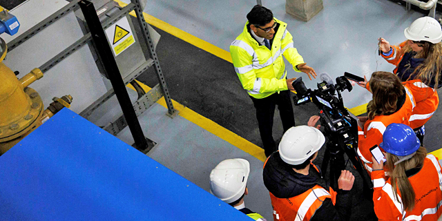 Prime Minister Rishi Sunak being filmed during a tour of a combined heat and power plant in Kings Cross, London