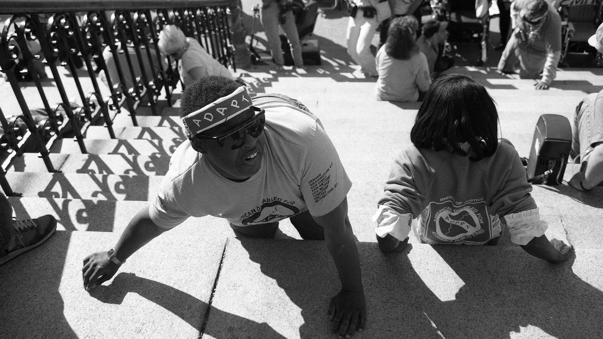 Wheelchair users crawling up the steps of the US Capitol building in March 1990 (Credit: Tom Olin Collection, University of Toledo Libraries)