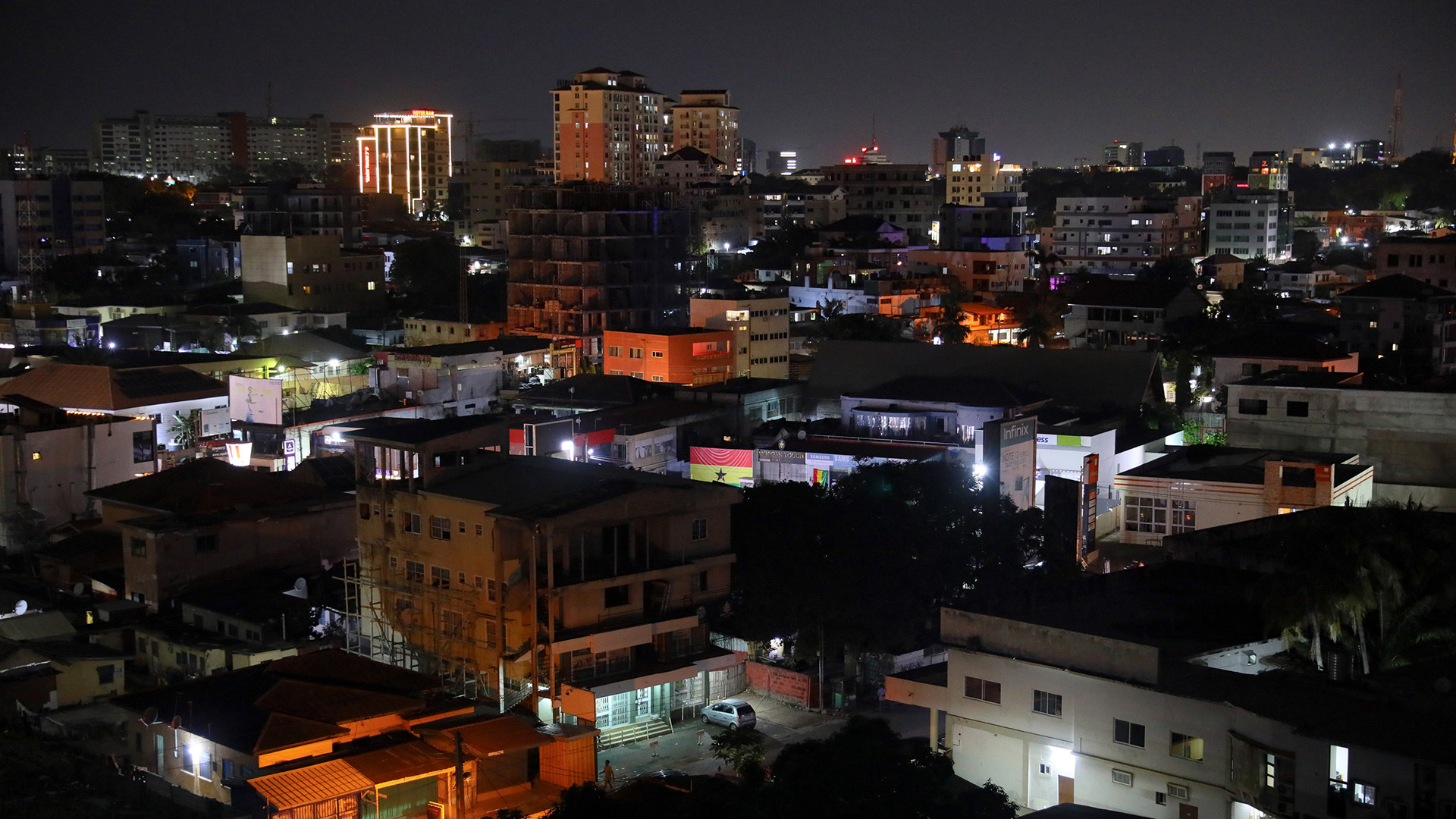 The night sky over buildings in Accra, Ghana, in December 2022 (Credit: Nipah Dennis/Bloomberg via Getty Images)