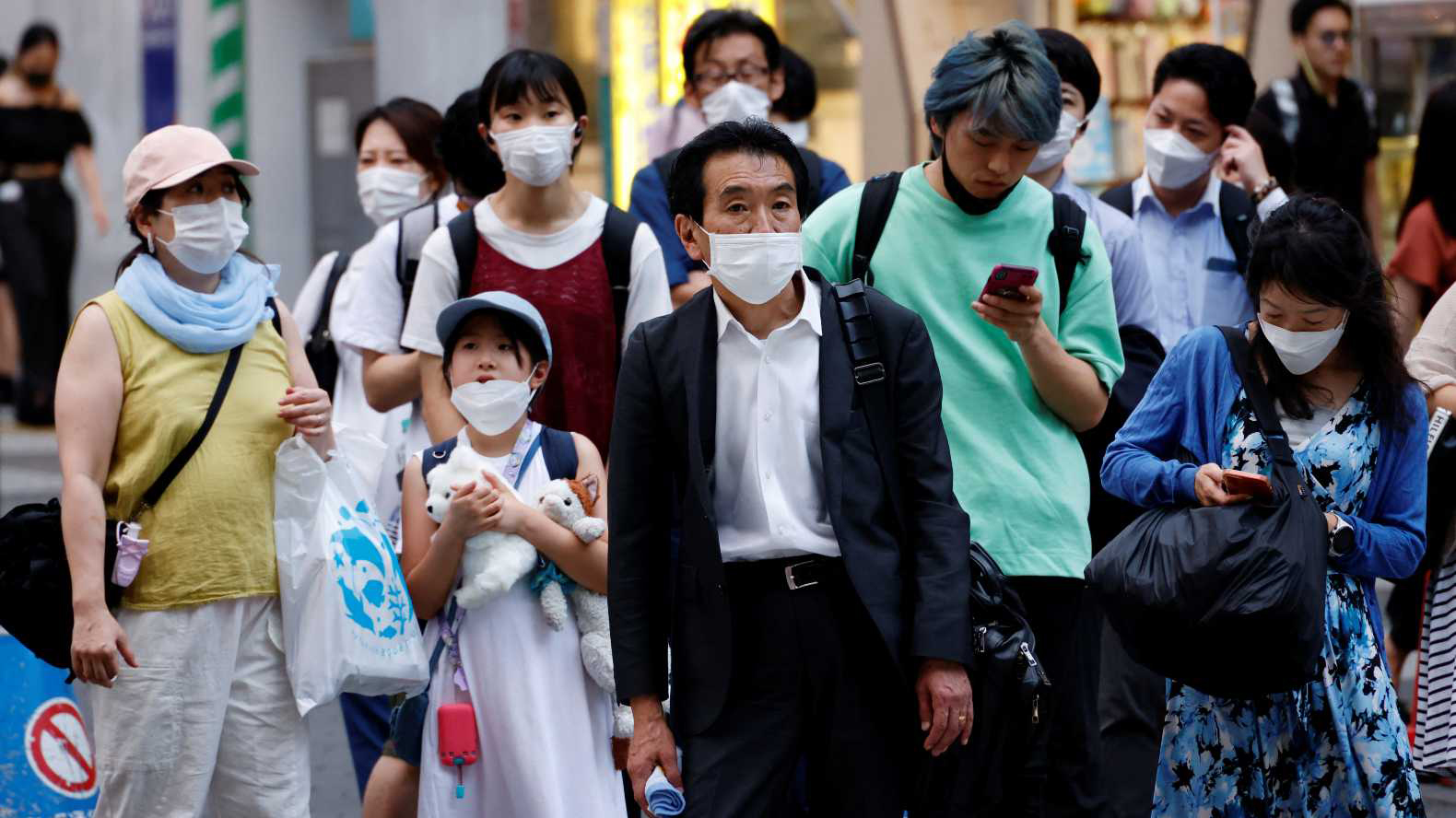 People wearing masks during the Covid-19 outbreak (Credit: Reuters/Kim Kyung-Hoon)