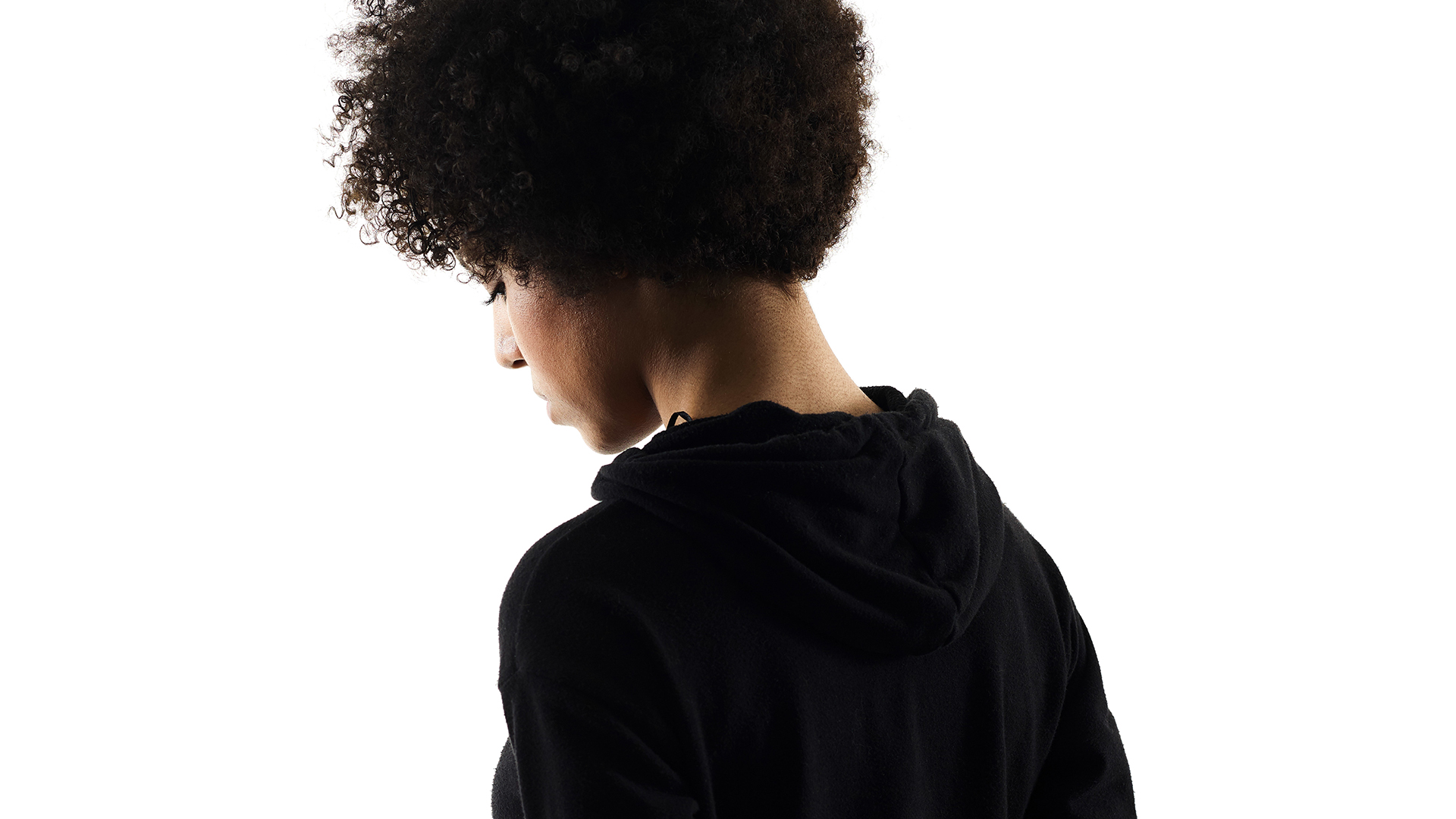 A woman turns away from the camera (Credit: Getty Images)